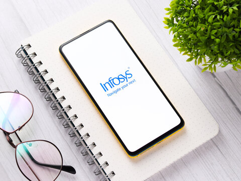 Assam, india - September 24, 2020 : Infosys logo on phone screen stock image.