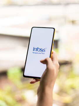 Assam, india - September 24, 2020 : Infosys logo on phone screen stock image.