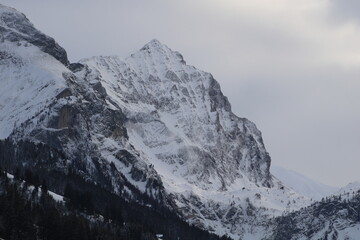 Fototapeta na wymiar Peak of Mount Arpelistock in winter, Swiss Alps.