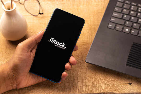Assam, india - April 19, 2021 :  iStock logo on phone screen stock image.
