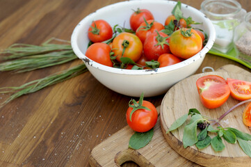 Ripe organic tomatoes in bowl