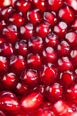 red and ripe fruit pomegranate with red grains