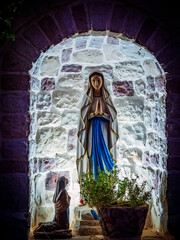 Sculpture of the Madonna near the Catholic Church.