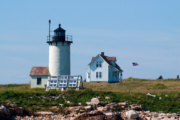 Fototapeta na wymiar Great Duck Island Lighthouse in Maine with Solar Panels For Energy
