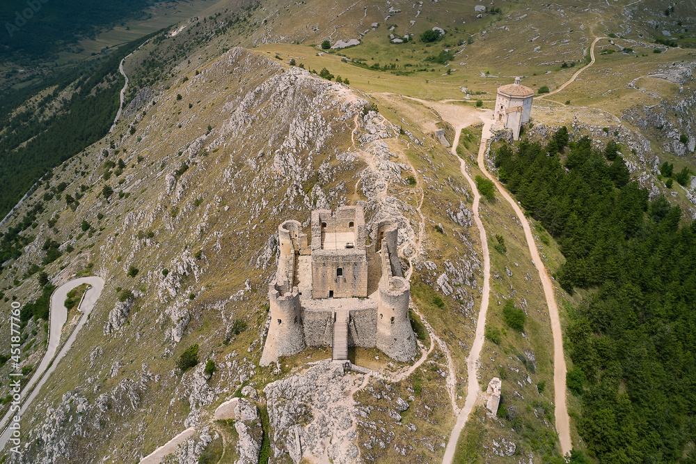 Wall mural aerial view of the medieval castle of rocca calascio and church of abruzzo