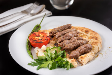 Turkish shish meatball traditional kofte. Spicy meatballs Kebab or Kebap.