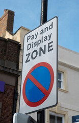 a pay and display parking zone sign