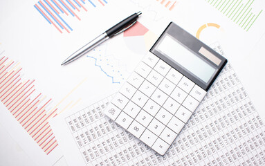 Naklejka na ściany i meble A business strategy using color charts and a calculator