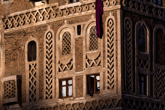 Traditional architecture in Sanaa, Yemen. Inhabited for more than 2.500 years at an altitude of 2.200 m, the Old City of Sanaa is a UNESCO World Heritage City.