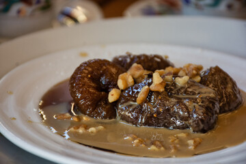 Traditional turkish dessert on plate, fig dessert