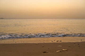 Sandy tropical beach at dawn in Crete.