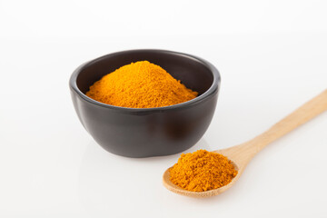 Fresh organic root and turmeric powder - Curcuma longa; Healthy Food.