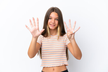 Little caucasian girl isolated on white background counting nine with fingers
