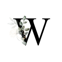 Capital letter W decorated with golden flower and leaves. Letter of the English alphabet with floral decoration. Green foliage.