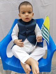 little Boy Holding Kashmir Flag With isolated White Background