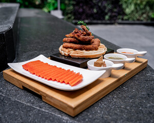 Exquisite papaya with waffle and chicken.