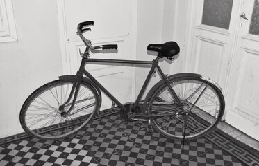 Fototapeta na wymiar Black and white picture of an old bike