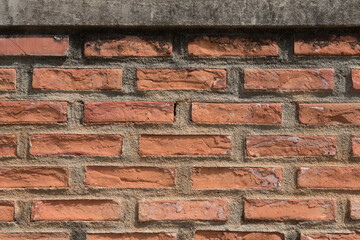 Retro orange brickwall background and texture.