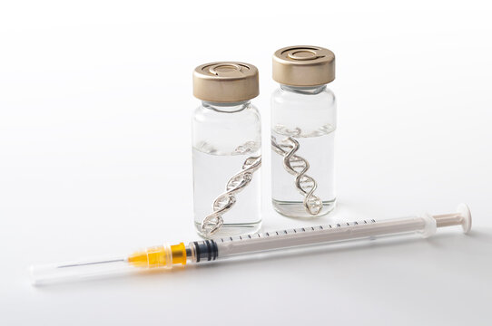 Acquired immunity vaccine, genetic pharmaceutical and immunization injection concept with glass vials contain DNA or mRNA double helix, hypodermic syringe and clear fluid isolated on white background