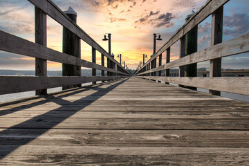 Obraz premium wooden pier at sunset