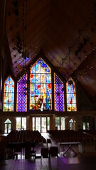 Fototapeta na wymiar shot of the beautiful window art in a religious Christian or catholic chapel 