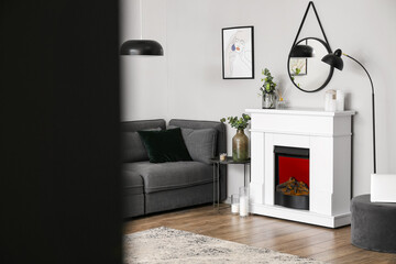 Interior of stylish living room with fireplace