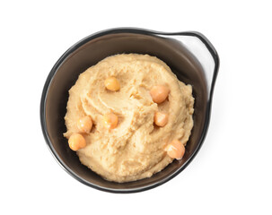 Bowl with tasty hummus on white background