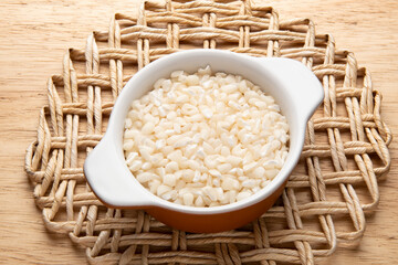 jar with grain - raw ingredient for preparing dishes -
