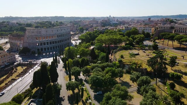 Aerial view over the Parco del Colle Oppio, towards the Colosseum, in Rome, Italy