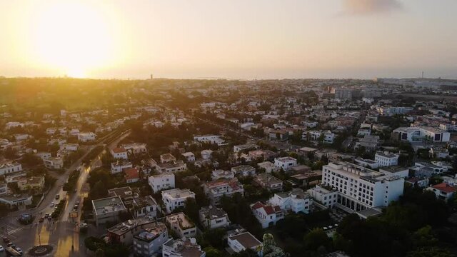 Aerial view of sunrise above the city of Casablanca, Morocco - rising, drone shot