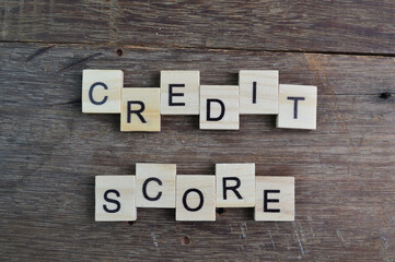 Square letters with text CREDIT SCORE. Business concept