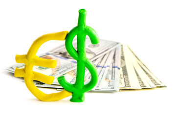 Plasticine dollar euro symbol on a hundred dollar bill isolated on white background. finance concept 