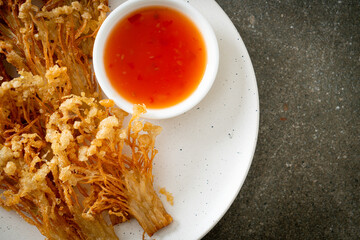 deep fried enoki mushroom or golden needle mushroom with spicy dipping sauce