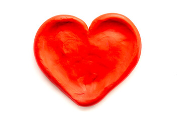 Red plasticine heart  on white background, cute valentine dough. Play dough