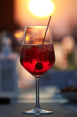 Glass with spritz cocktail.