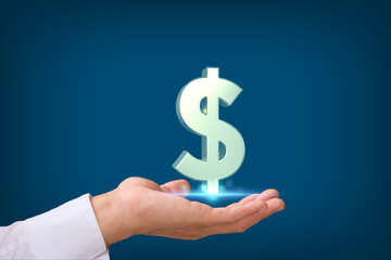 Hand holding dollar sign on blue background, saving money and business growth concept,finance and investment concept