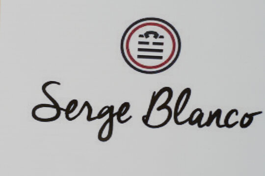 serge blanco text brand and sign logo for french sporty clothing trademark rugby fashion shop