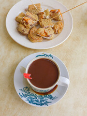 Morning breakfast snacks. Breakfast Desserts. In between meals' snacks, before or after the main dish. Sweet herbal soup, milk coofee and deep fried nian gao with yam, a popular delicacy.