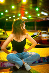 Night portrait of a charismatic girl