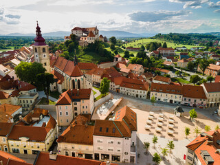 Ptuj in Slovenia Townscape. City Tower, Cathedral and Ptuj Castle. Drone View