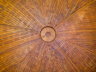 The wooden roof of the gazebo.