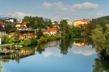 Fototapeta na wymiar Old Houses in Novo Mesto Slovenia at Krka River in Sunny Day