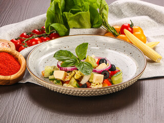 Traditional Greek salad with feta and vegetables