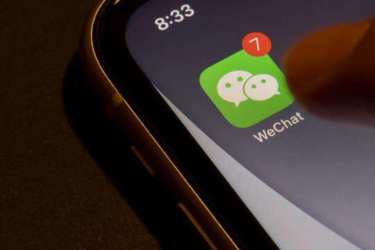 Portland, OR, USA - Aug 19, 2021: WeChat mobile app icon is seen on an iPhone. WeChat is a Chinese multi-purpose messaging, social media and mobile payment app developed by Tencent.