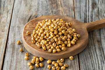Roasted chickpea. Chickpeas on wood floor. Bulk Chickpea grains
