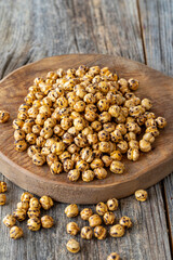 Roasted chickpea. Chickpeas on wood floor. Bulk Chickpea grains