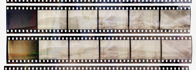 35mm positive filmstrips with empty frames, real scan of film material with cool scanning light...