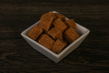 Cane sugar cubs in the bowl