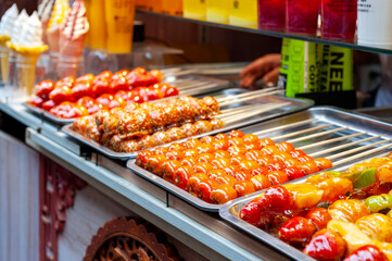 Local street food and snacks sold at the Qibao Old Street in Qibao Ancient Town, a historic water township of Qibao in the Minhang District of Shanghai, China