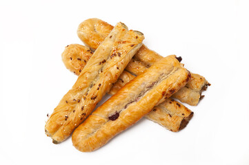 Three rollinis with different fillings on a white background
